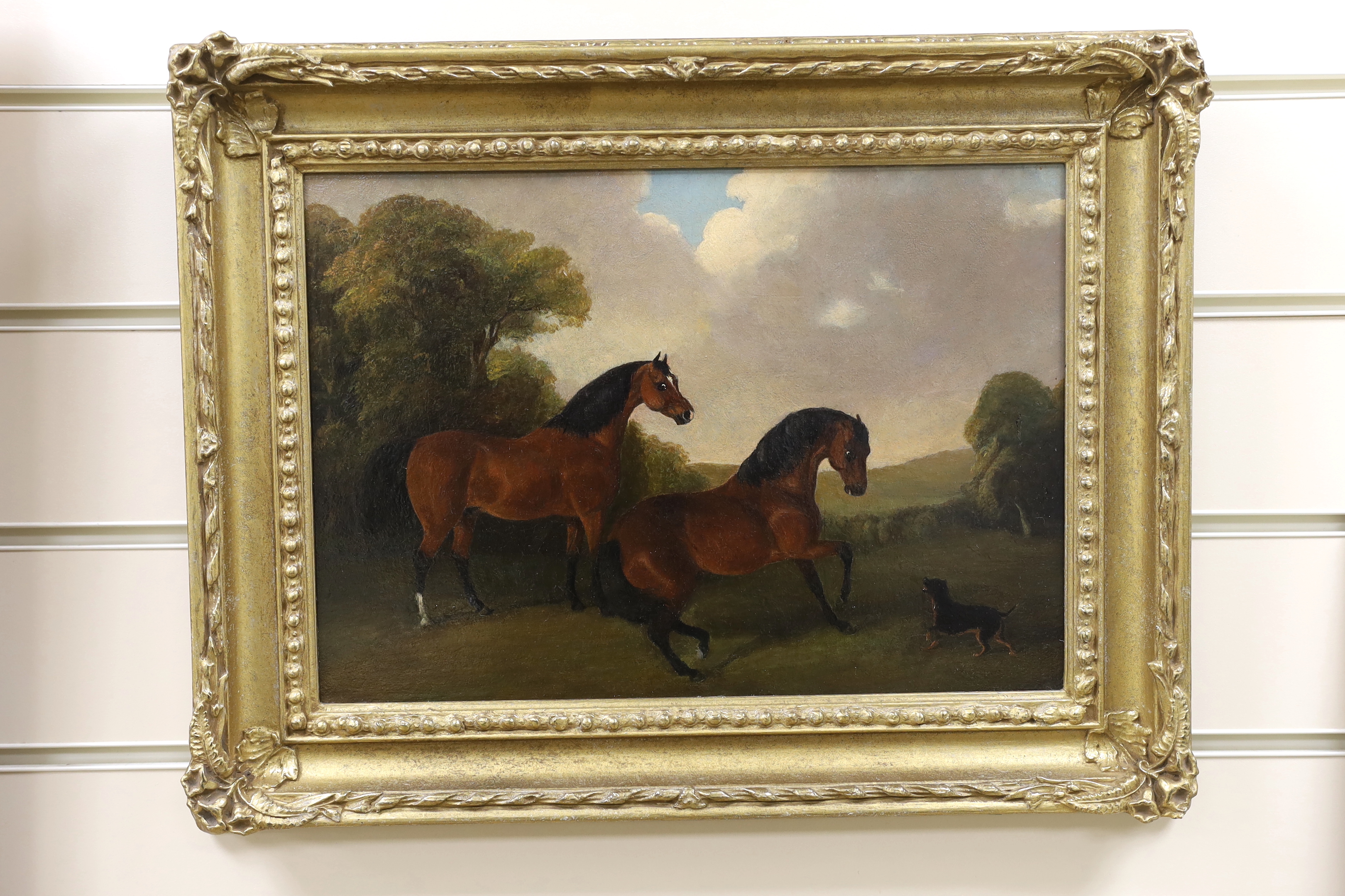 After George Stubbs (1724-1806), oil on board, Bay horses and terrier in an open landscape, 23 x 33cm